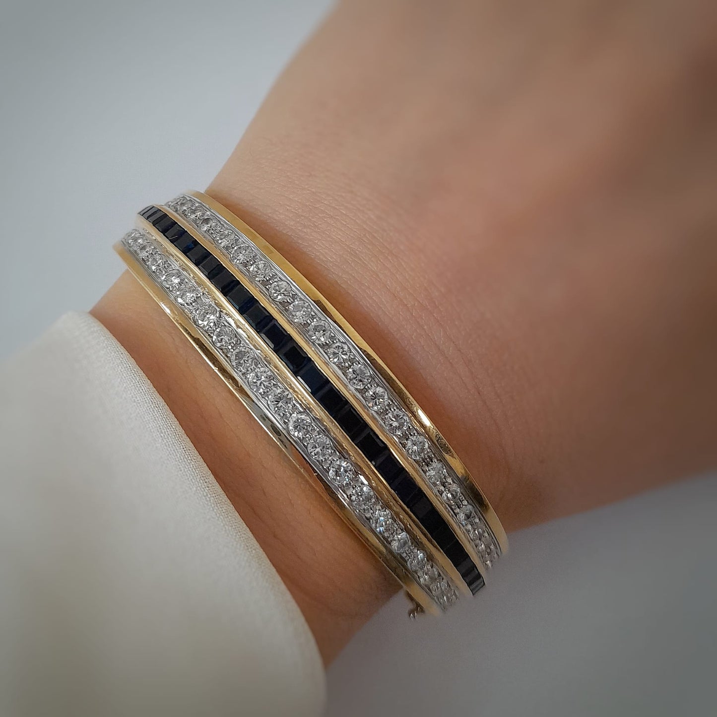 Bracciale vintage rigido con zaffiri e brillanti