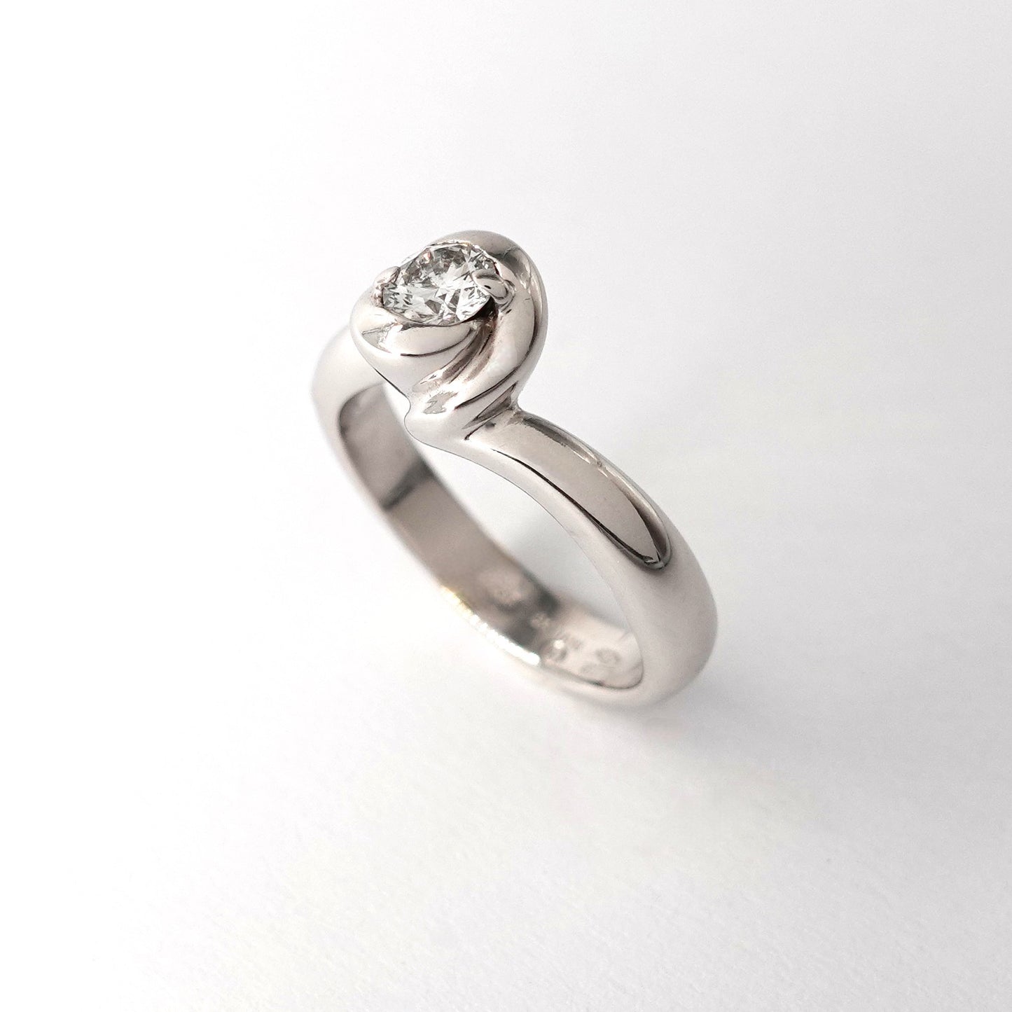 Solitario Damiani in oro bianco
