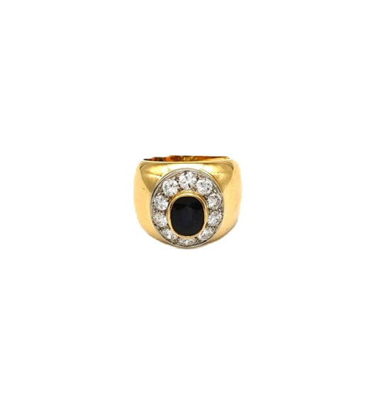 Anello in oro con diamanti e pietra nera