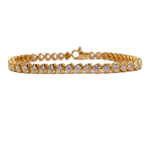 Bracciale in oro con zirconi a cuore