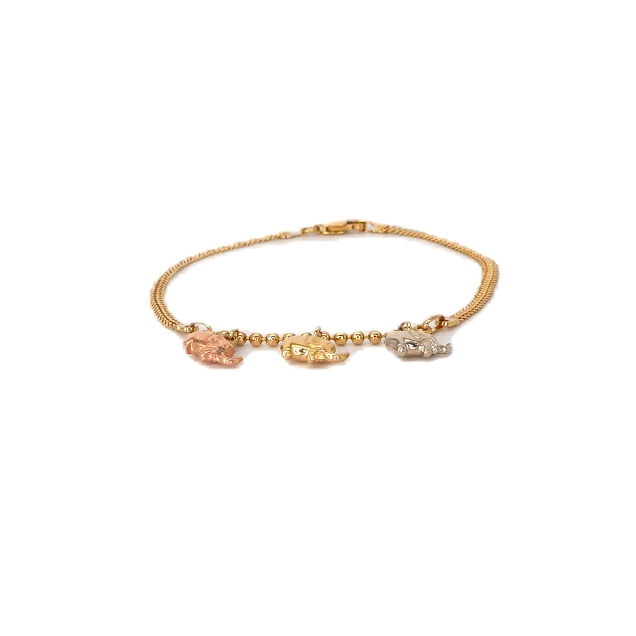 Bracciale in oro con elefanti