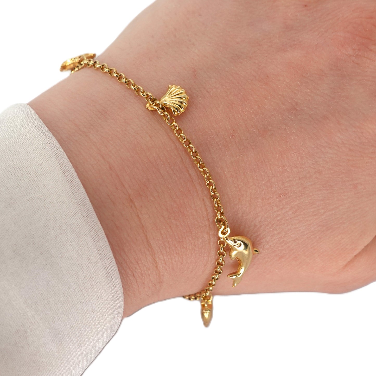 Bracciale in oro con charms