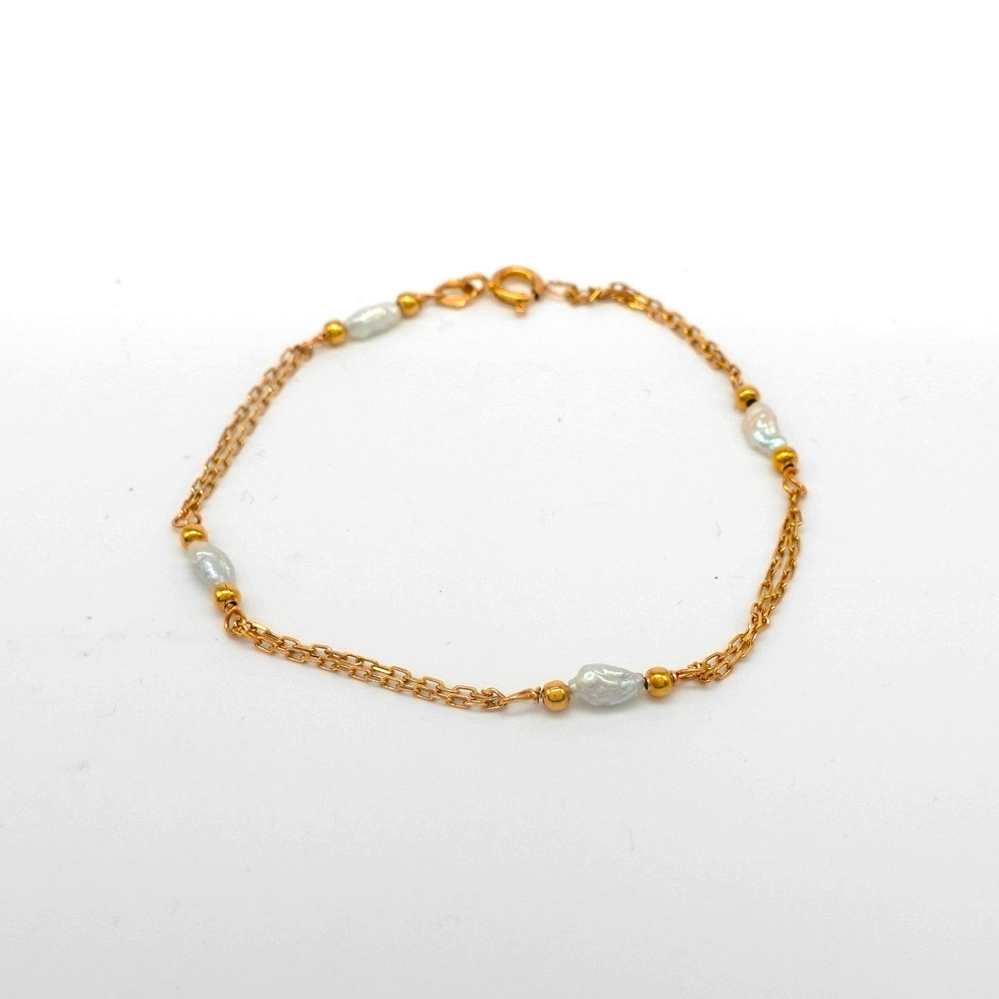 Bracciale in oro giallo con perle