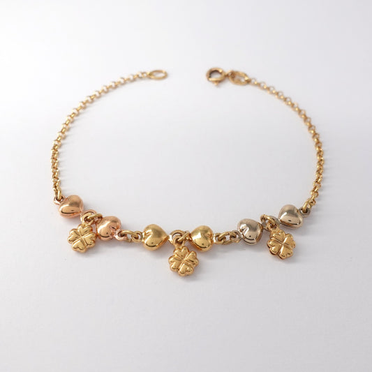 Bracciale  con cuori e quadrifogli.