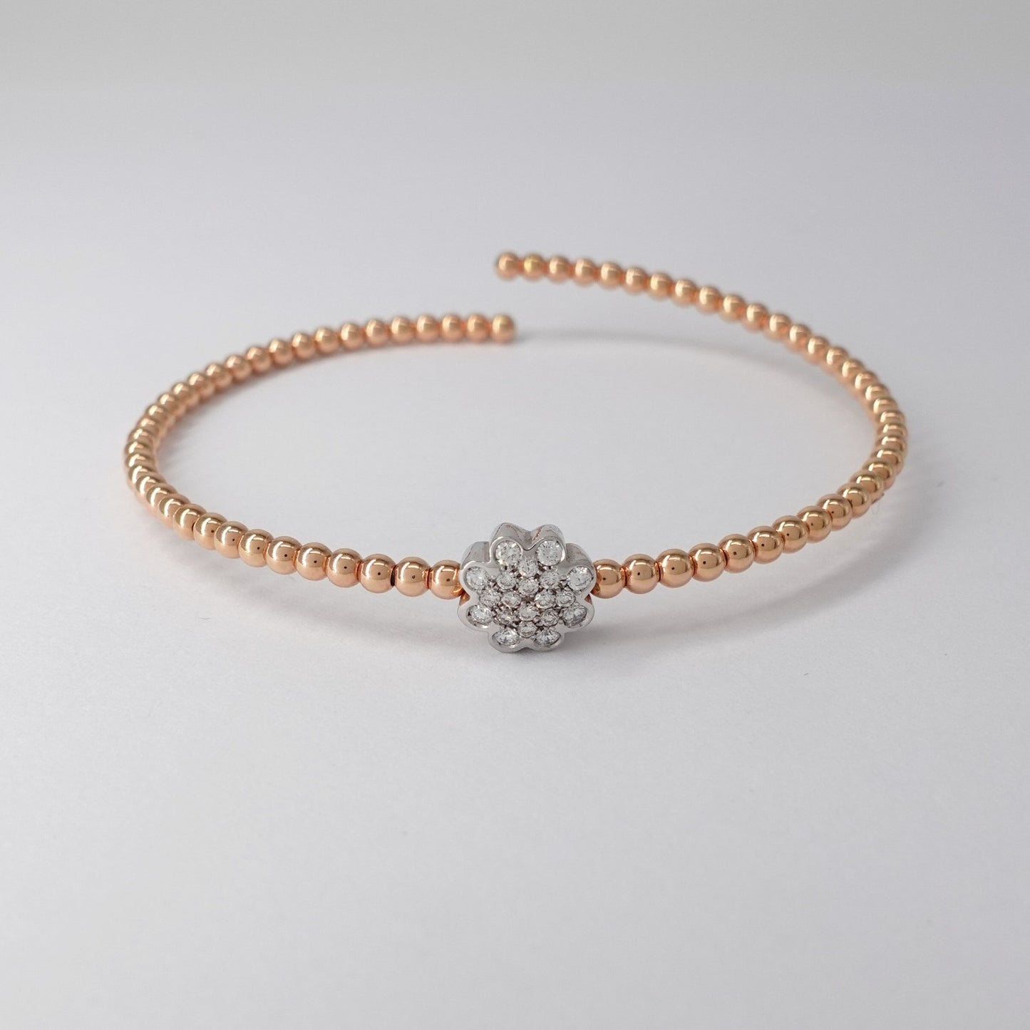 Bracciale rigido con fiore
