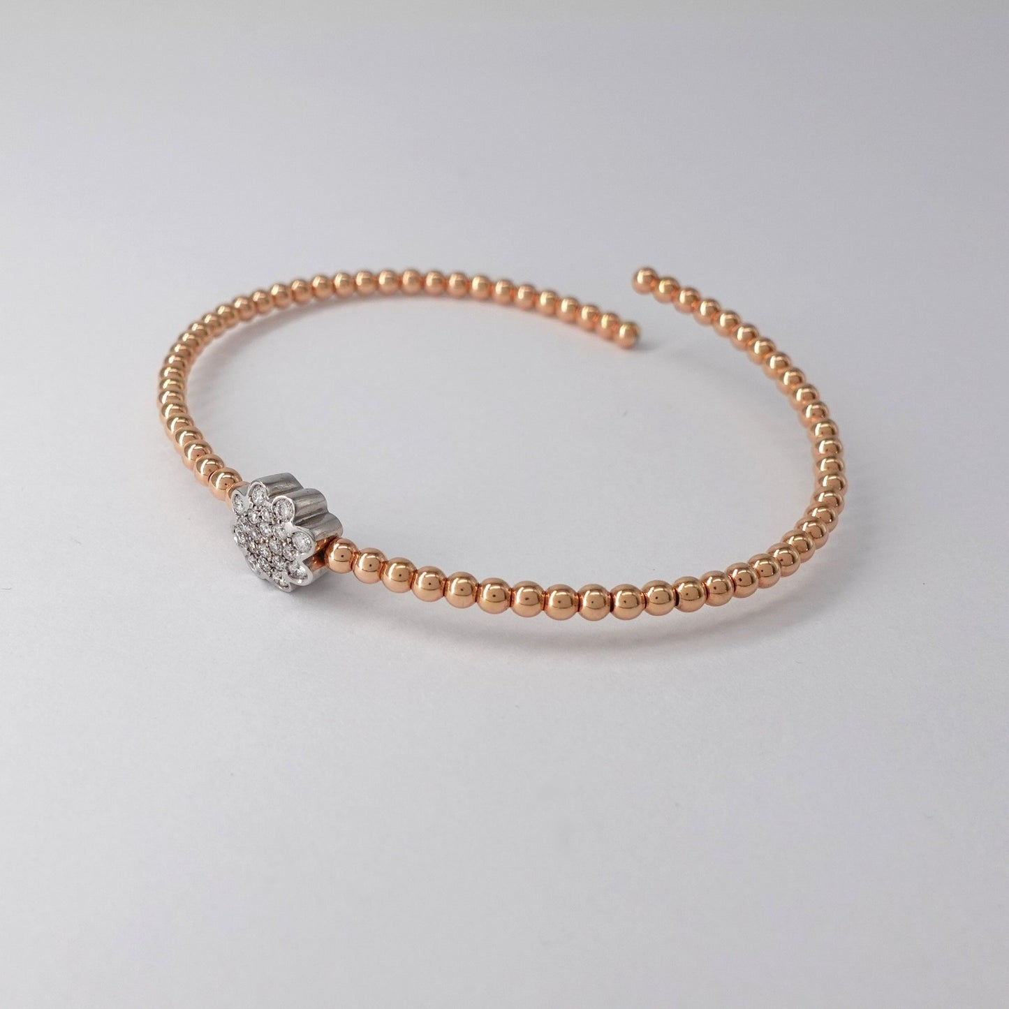 Bracciale rigido con fiore