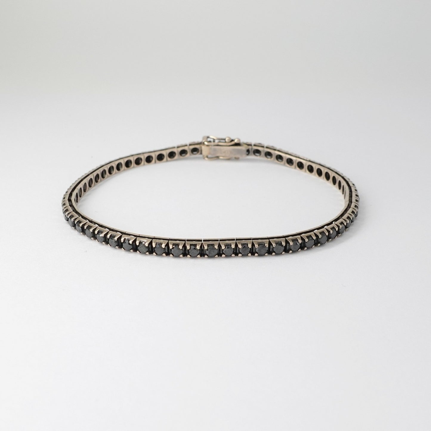 Tennis in oro brunito