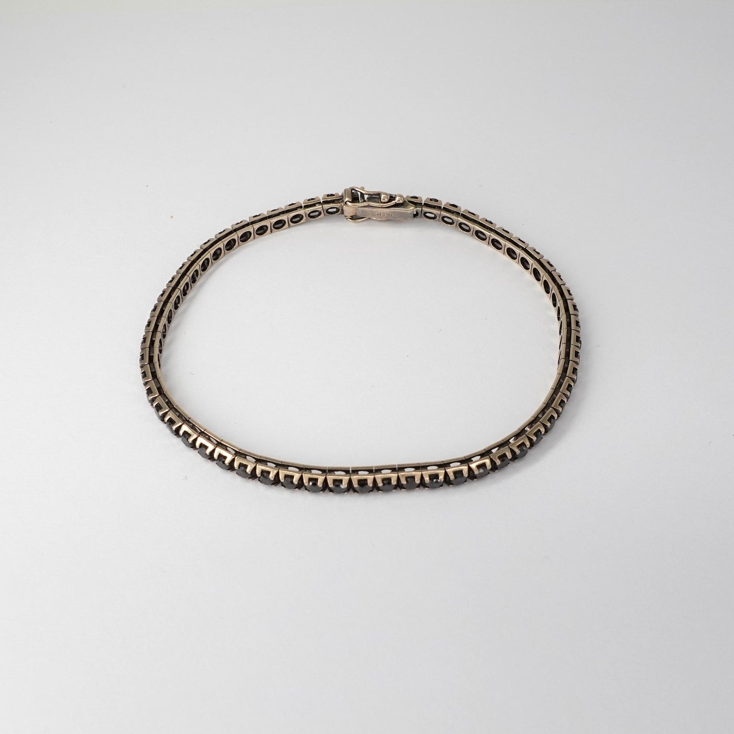 Tennis in oro brunito