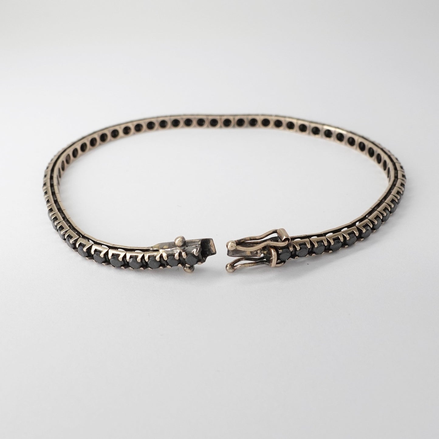 Tennis in oro brunito