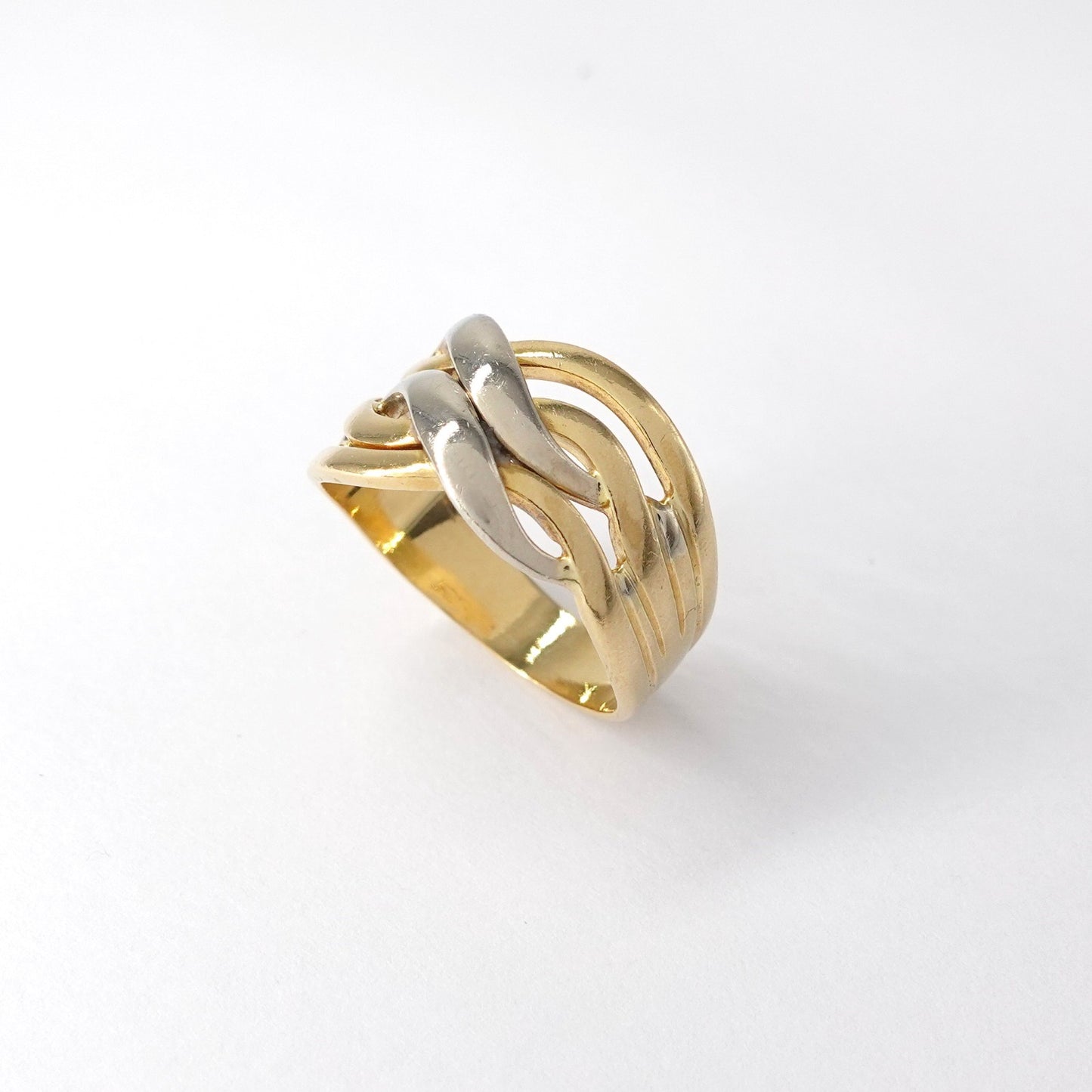 Anello a fascia intrecciata