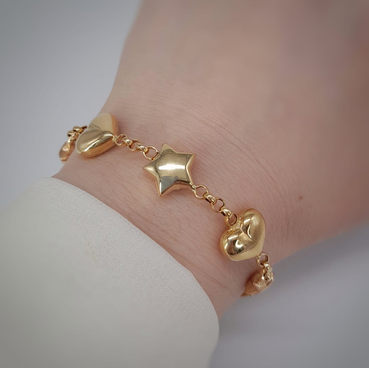Bracciale con stelle e cuori