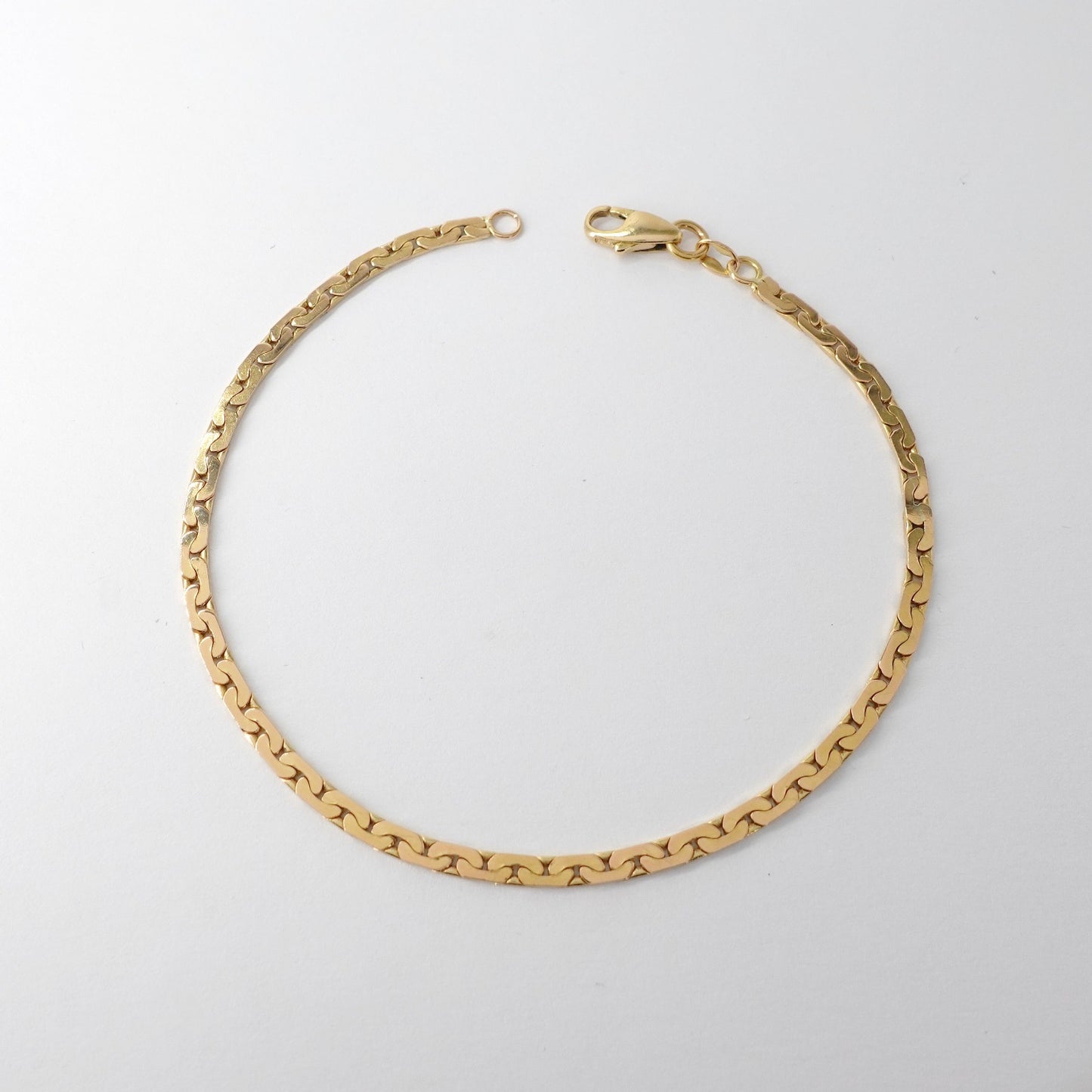 Bracciale a maglia piatta