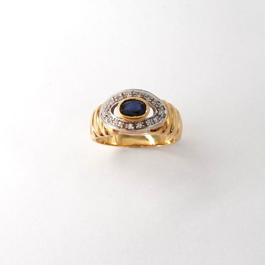 Anello a fascia con zaffiri e diamanti