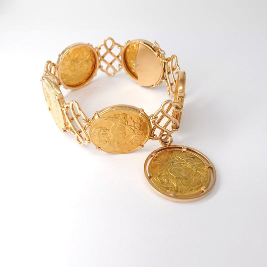 Bracciale con monete raffiguranti figure mitologiche