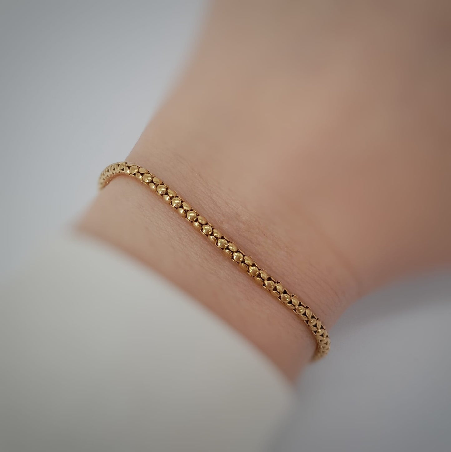 Bracciale a maglia tubolare
