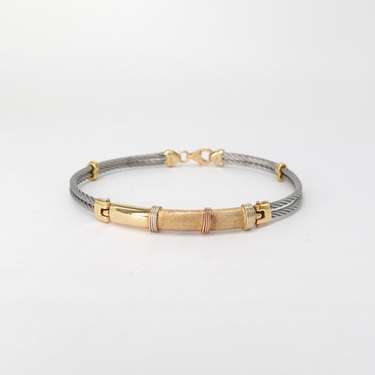 Bracciale in oro  e acciaio