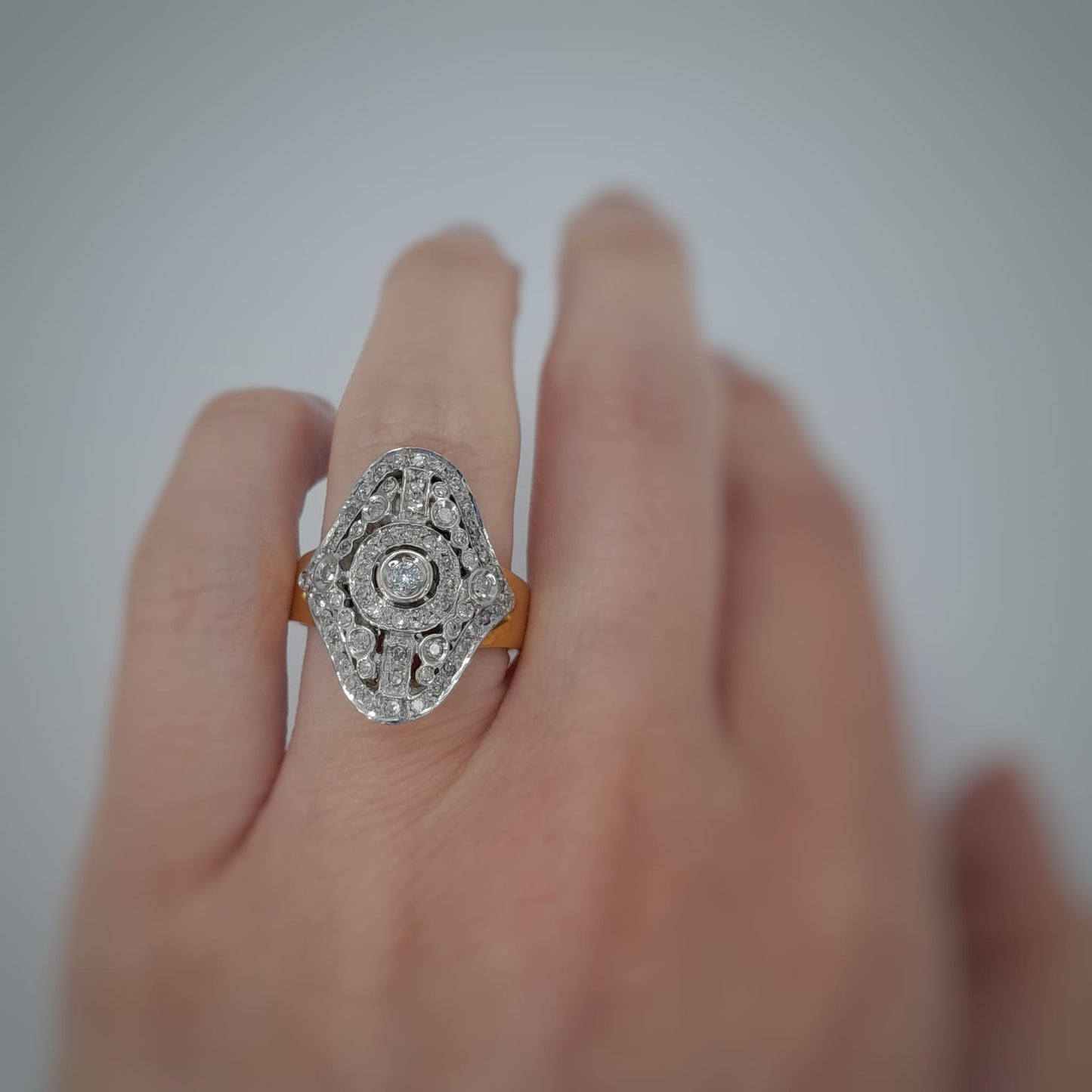 Anello in oro giallo e bianco 18kt con diamanti