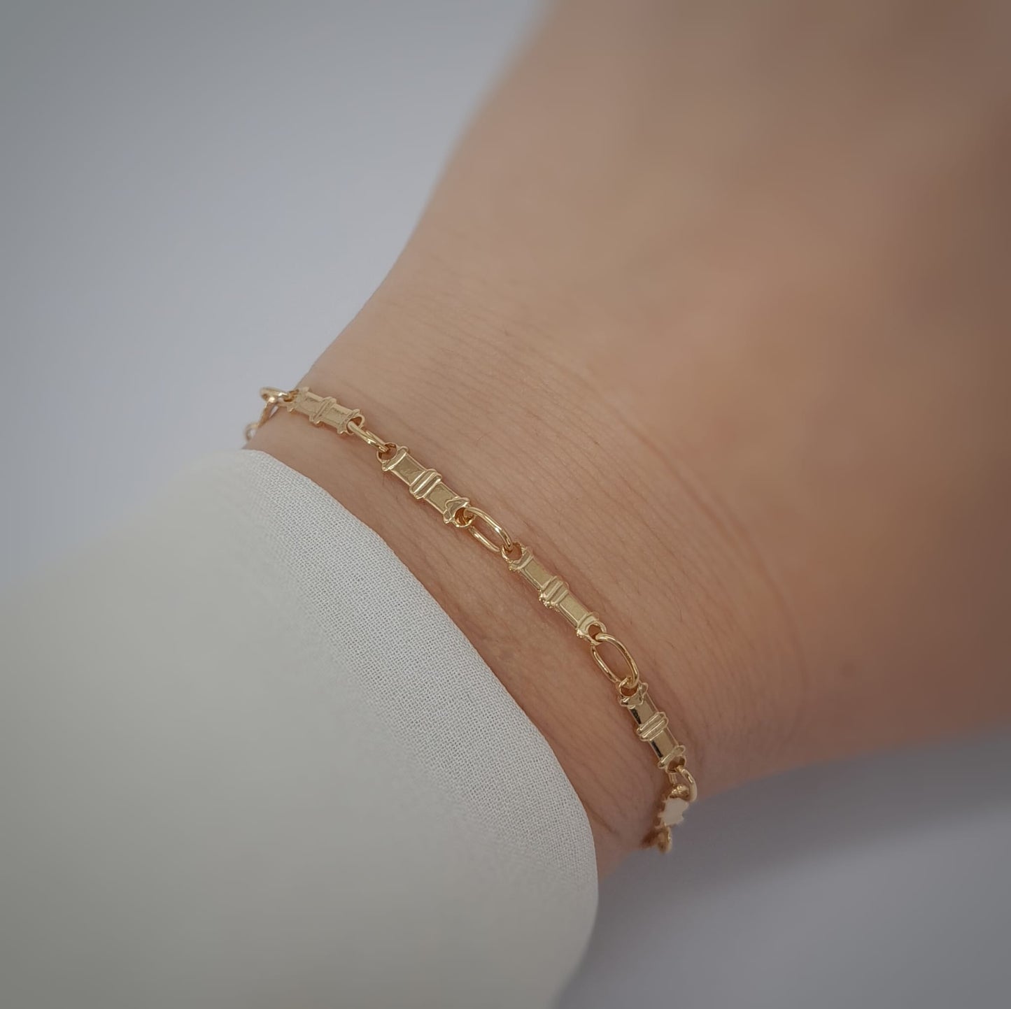 Bracciale con maglia a segmenti