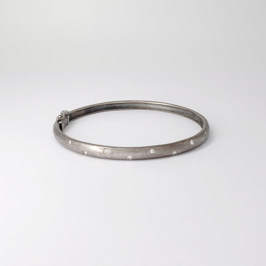 Bracciale rigido  brunito con diamanti