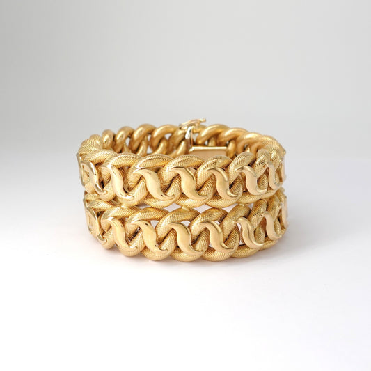 Bracciale a fascia alta intrecciata