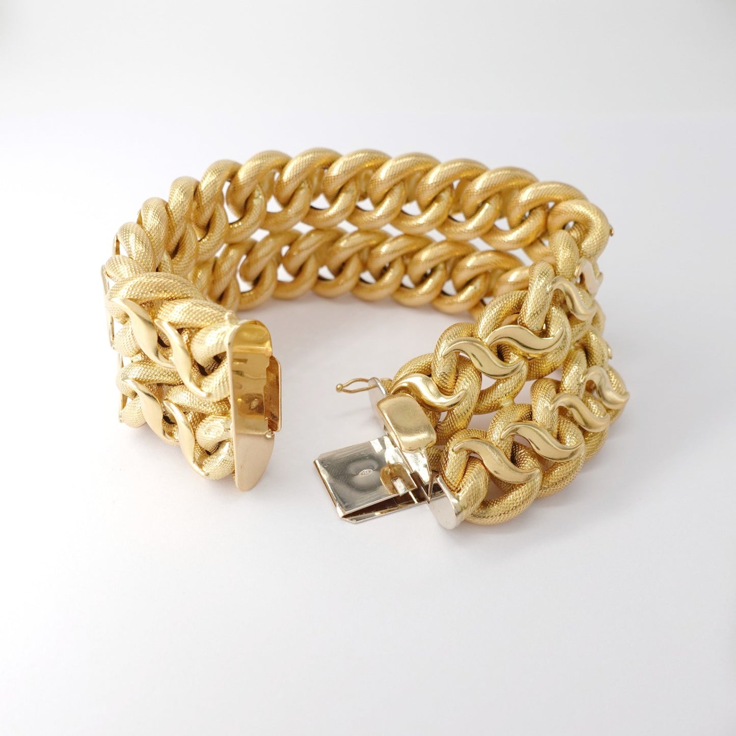 Bracciale a fascia alta intrecciata