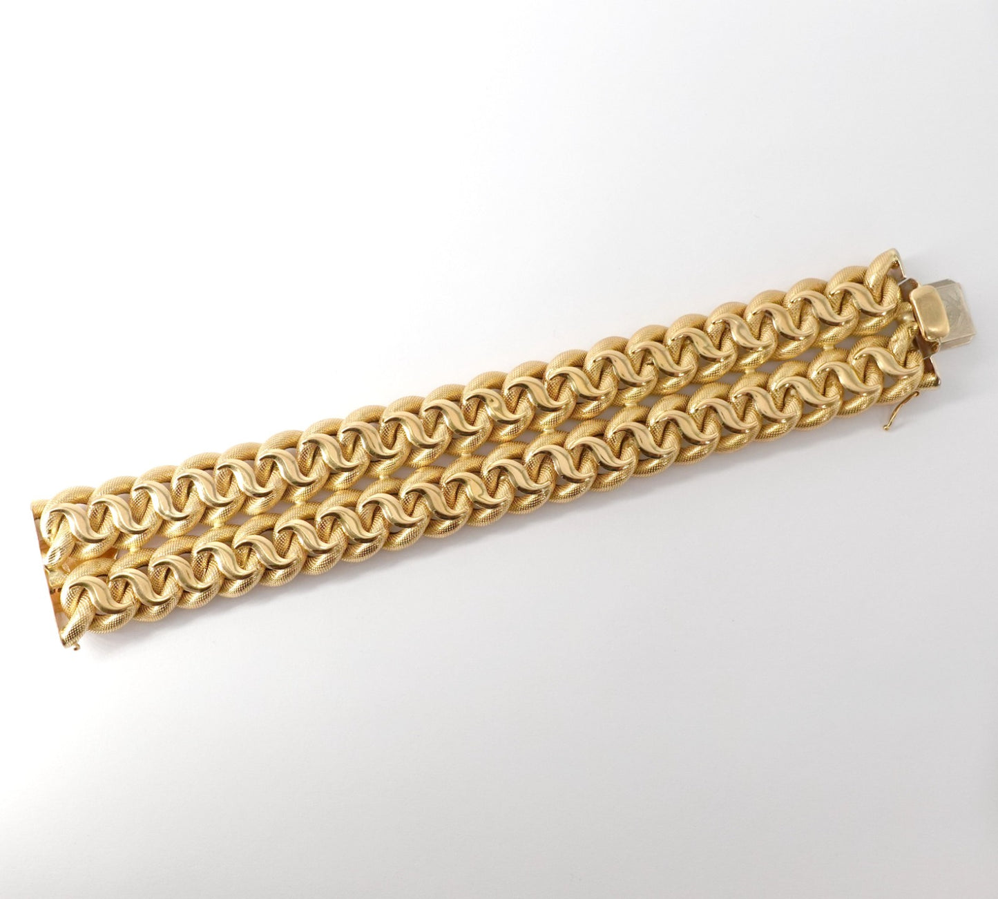 Bracciale a fascia alta intrecciata