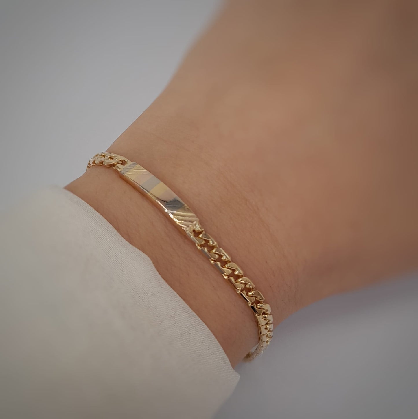Bracciale con targhetta
