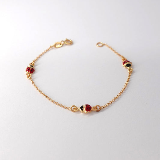 Bracciale bimba in oro giallo 18kt con coccinelle smaltate Peso: 1,35gr Lunghezza: 14cm Cod.2610M Prezzo: 180€