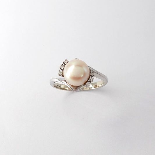 Anello Contrarié  con Perla Naturale e Diamanti