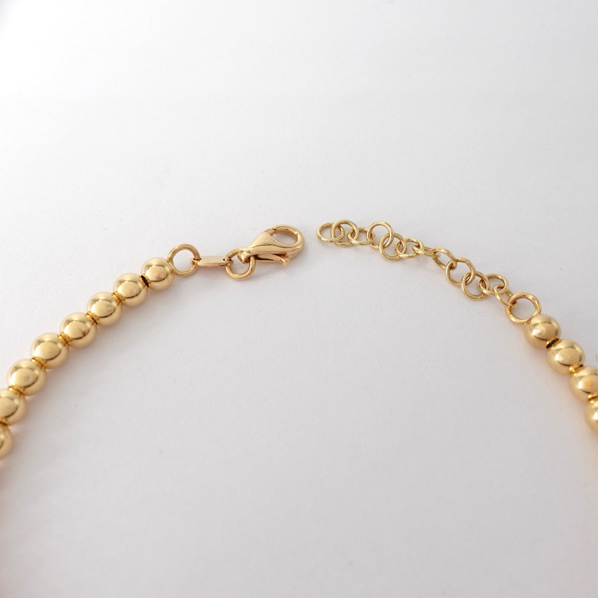 Bracciale con maglia a pallini