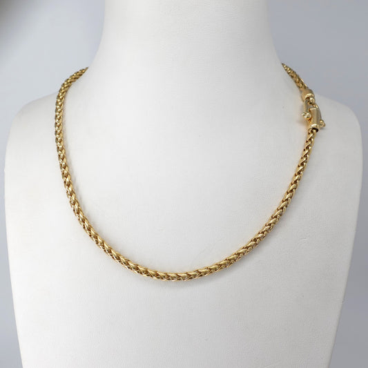 Girocollo in oro giallo 18kt con maglia a spiga e gemma cabochon
