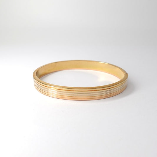 Bracciale rigido nei tre colori dell'oro