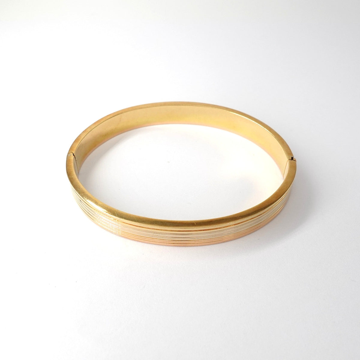 Bracciale rigido nei tre colori dell'oro