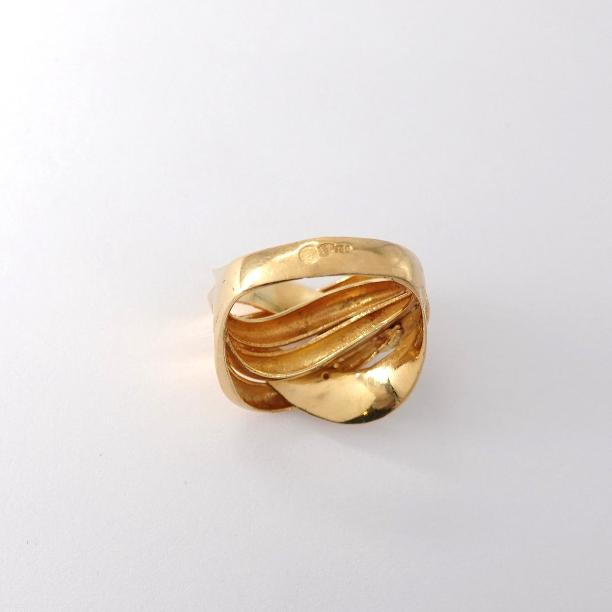 Anello  a fascia intrecciata