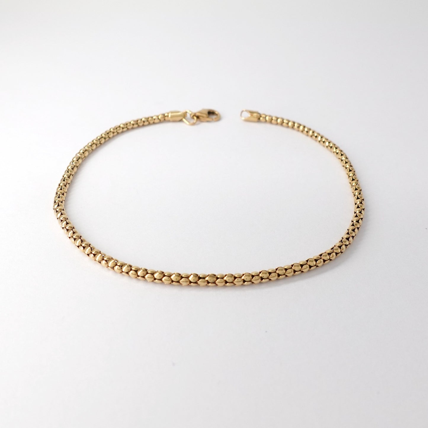 Bracciale a maglia tubolare