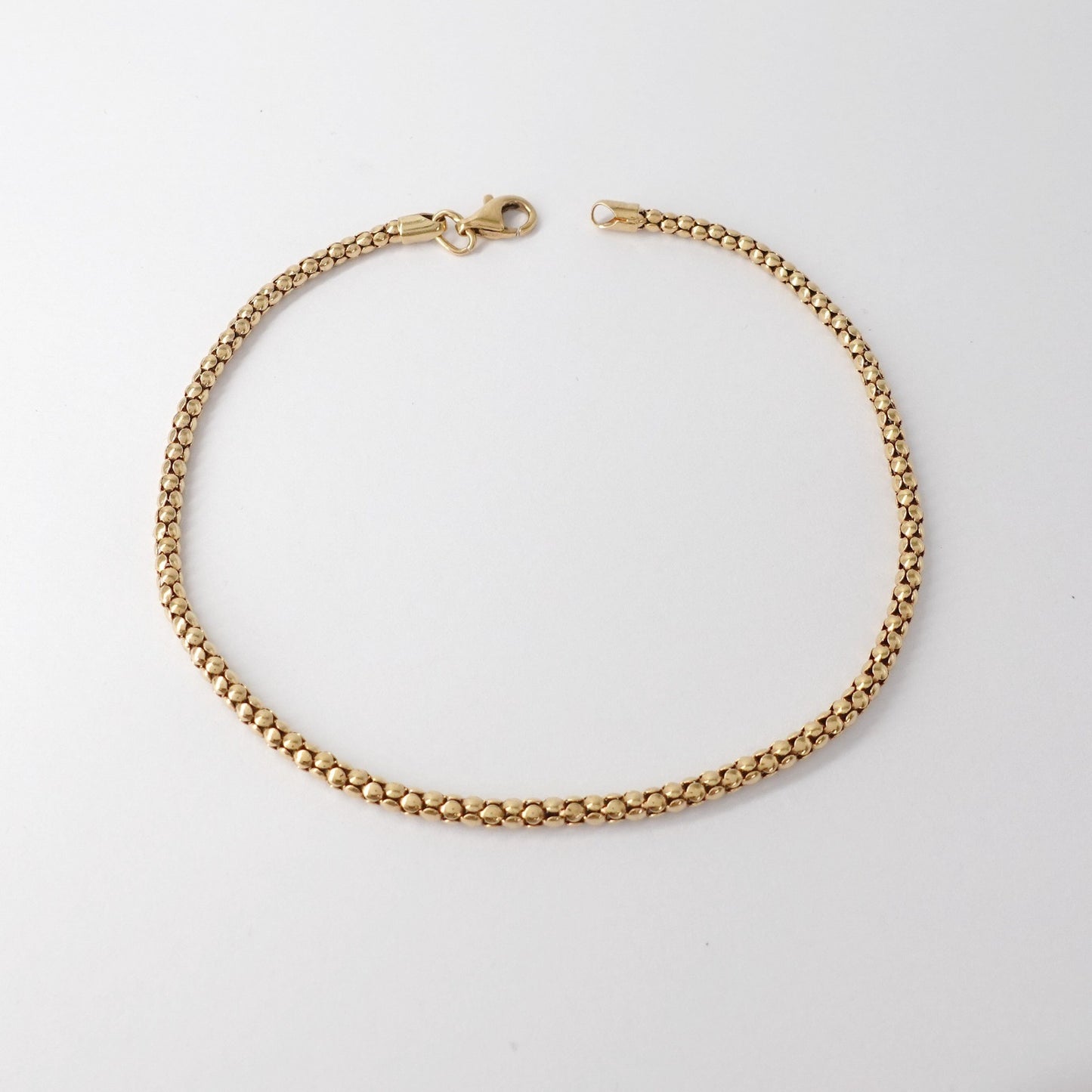 Bracciale a maglia tubolare