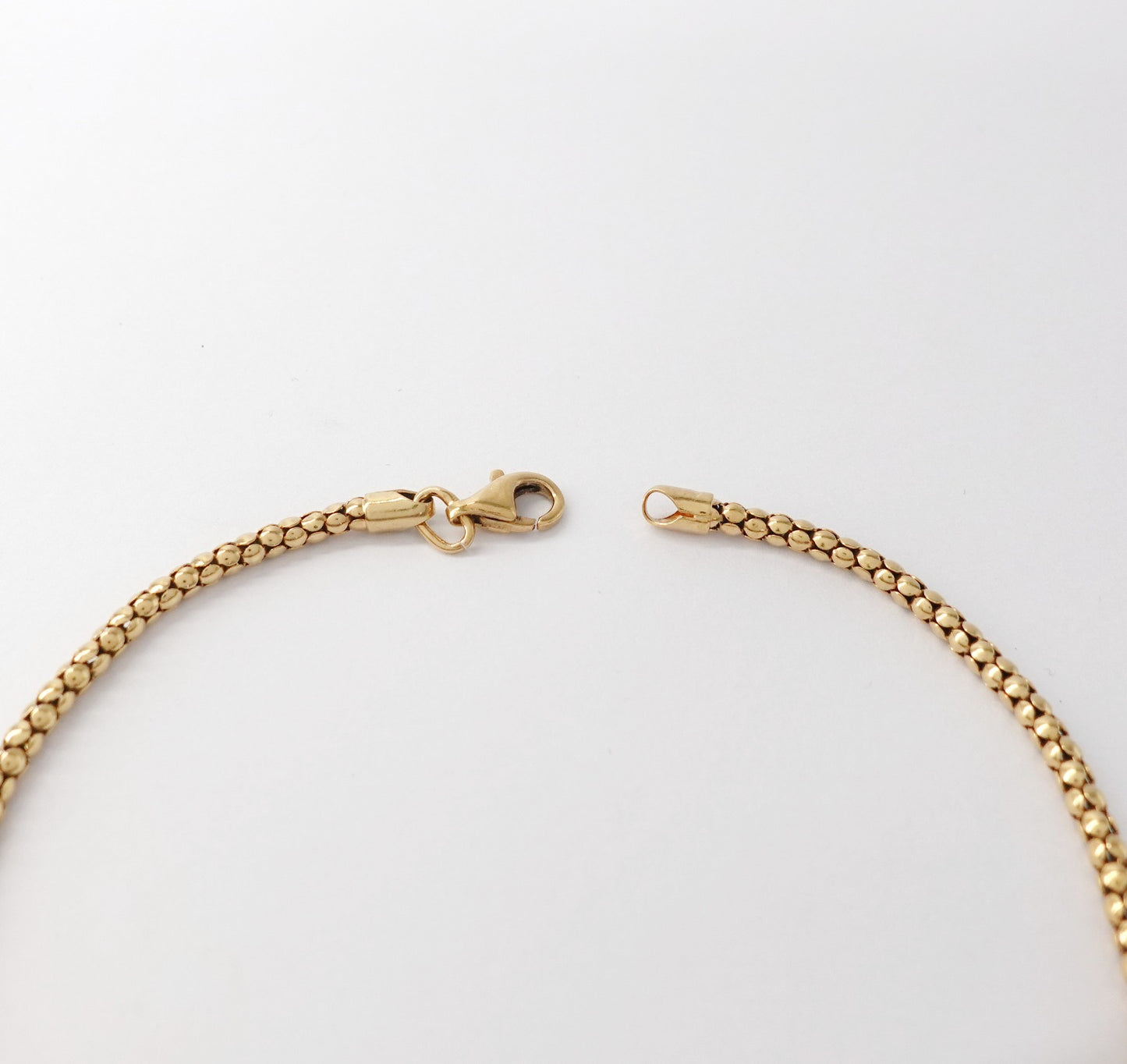 Bracciale a maglia tubolare
