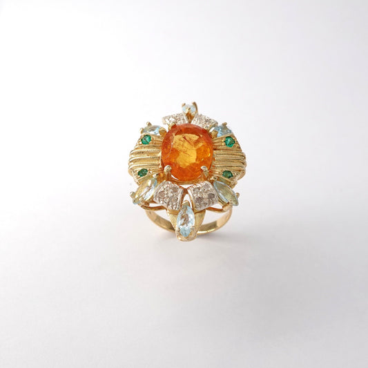 Anello con diamanti  e topazi