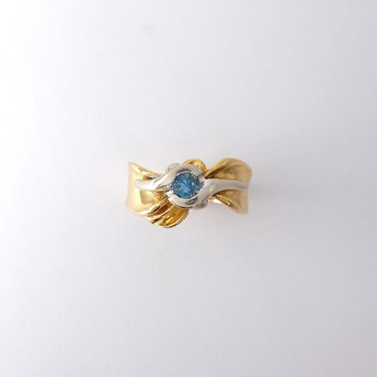 Anello fiocco con topazio
